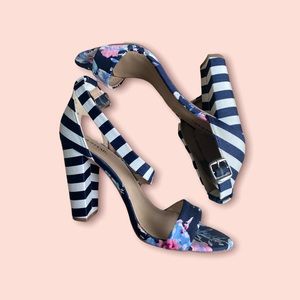 Navy and white striped heels with flowers.